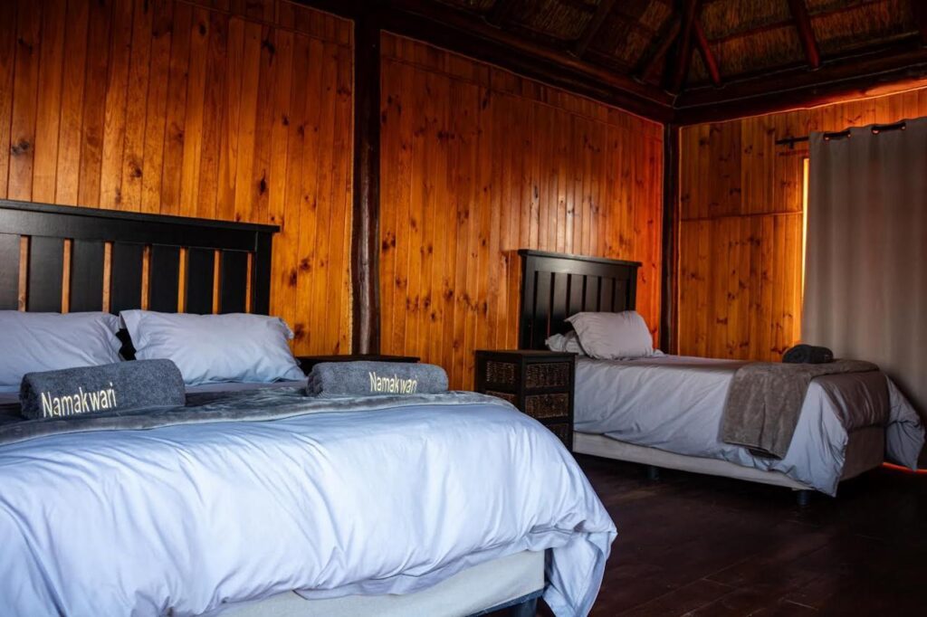 Cozy bedroom at Kalahari hunting lodge Namakwari